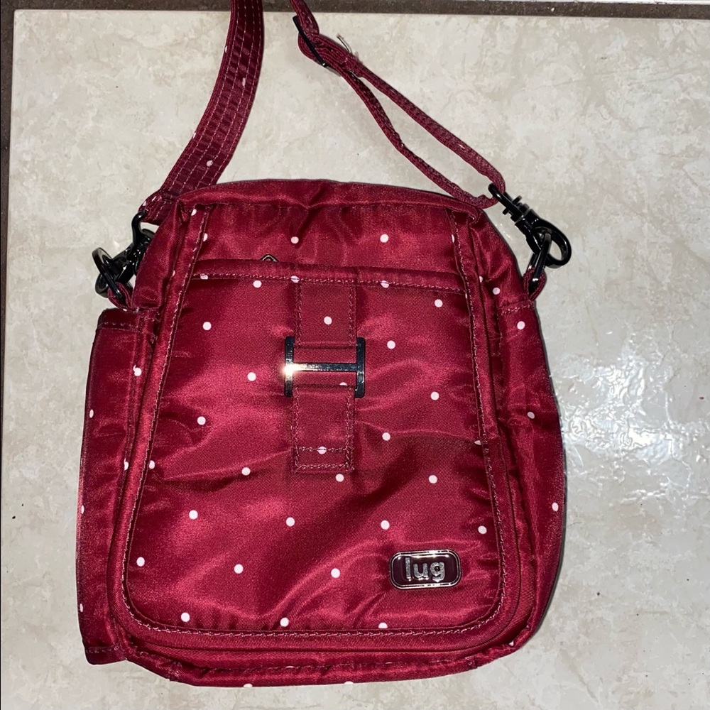 Lug travel purse polka dot in wine color.